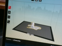 We then transferred the 3-D model to MakerBot's proprietary modeling software, cut away some table reflection 123D Catch picked up during imaging, and crossed our fingers that the MakerBot would work.
